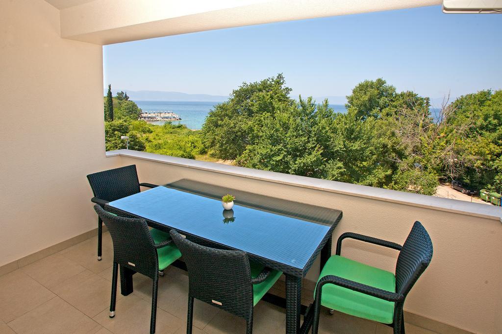 Apartments Maslina I Njivice Szoba fotó