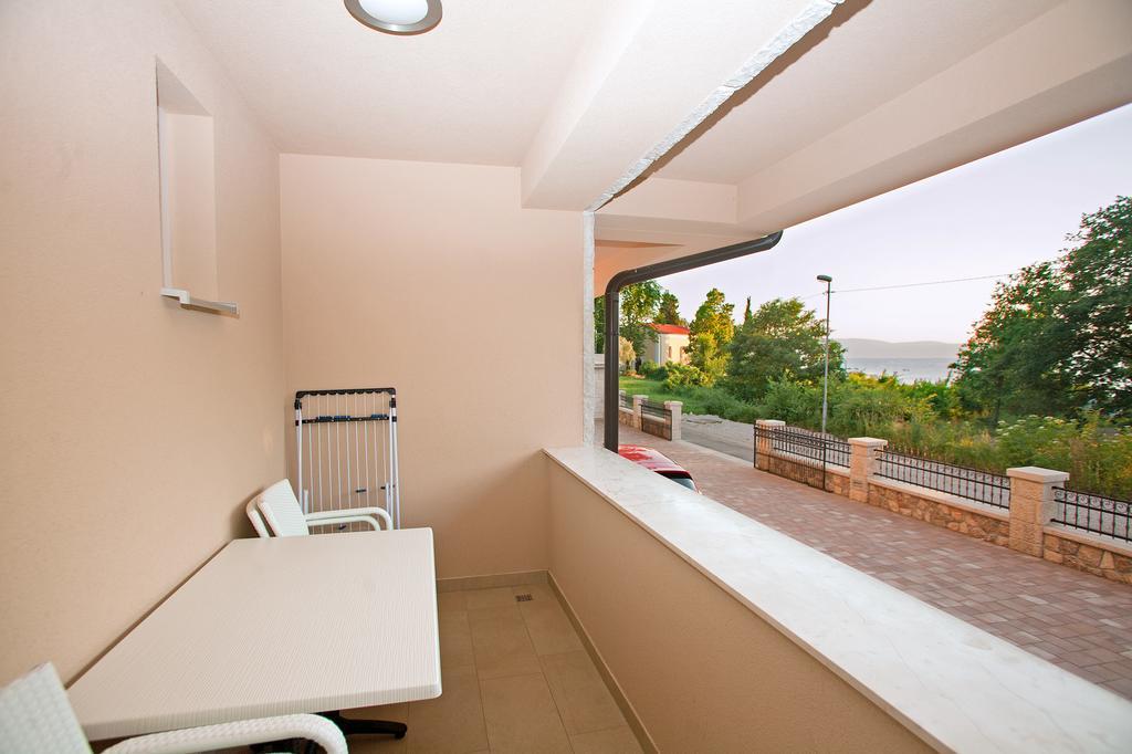 Apartments Maslina I Njivice Szoba fotó